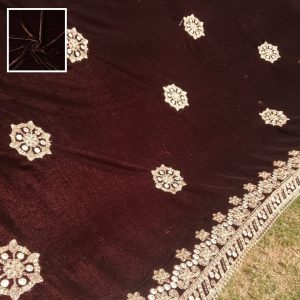 Mirrored Brown - Embroided Velvet Shawl Soft, stunning, luxurious, and graceful, this velvet shawl is perfect to drape around yourself at any formal event. Gorgeous velvet base with intricate thread embroidery on top. The perfect combination of dazzle and glam! Material: Velvet Size: 2.5 yards long Made in Pakistan.